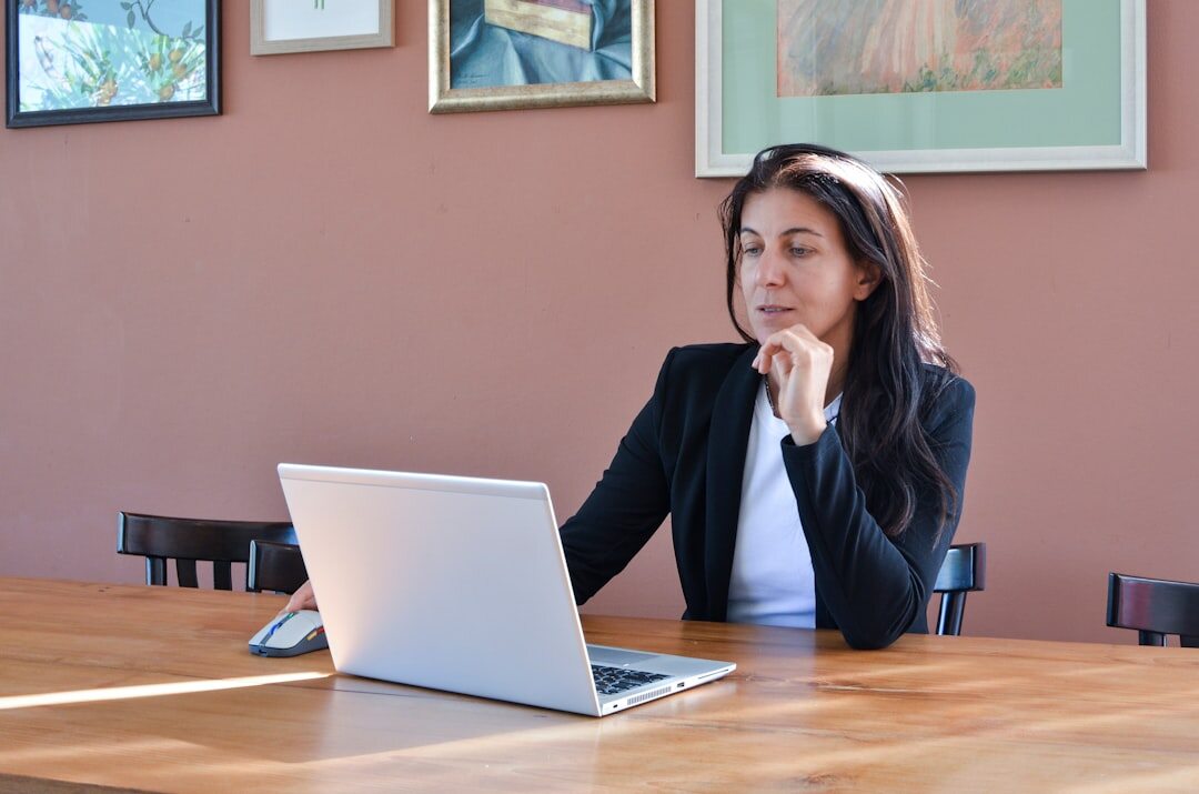 person using laptop for online meeting